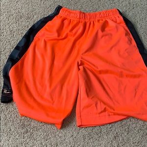 Neon orange Nike elite basketball shorts